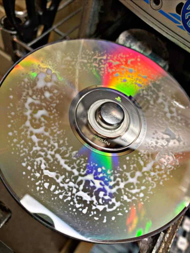 Image of disc being cleaned